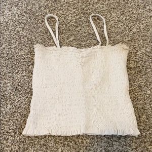 Super cute white tank top with stretchy design